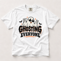 Ghosting Everyone Halloween ghost graphic on a white Comfort Colors T-shirt