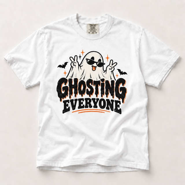 Ghosting Everyone Halloween ghost graphic on a white Comfort Colors T-shirt