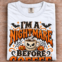 I'm a Nightmare Before Coffee Halloween shirt in white with oversized orange and black print