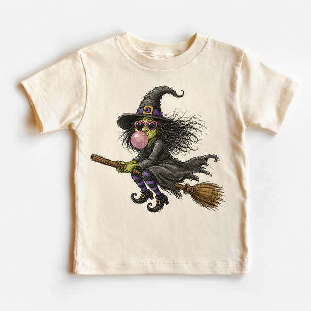 Blowing Bubbles Witch Kids Halloween – Flying Broom Witch graphic T-shirt by Madi Moosh