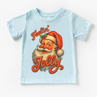 Feelin' Jolly Santa Christmas design on a blue garment.