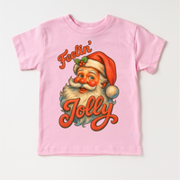 Feelin' Jolly Santa Christmas design on a pink garment.