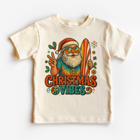 Christmas Vibes Surfing Santa design on a natural garment.