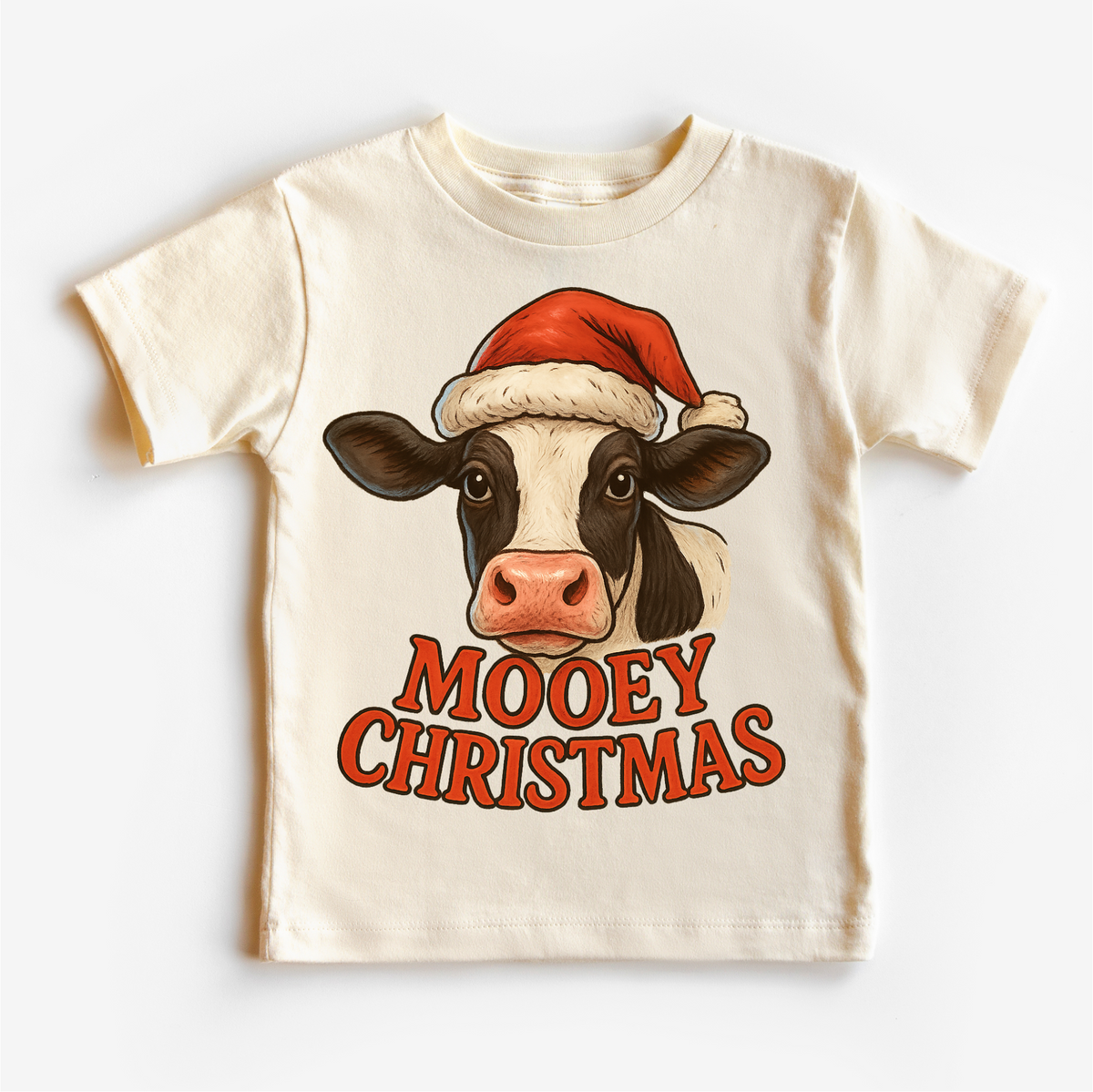 Mooey Christmas Country Cow design on a natural garment.