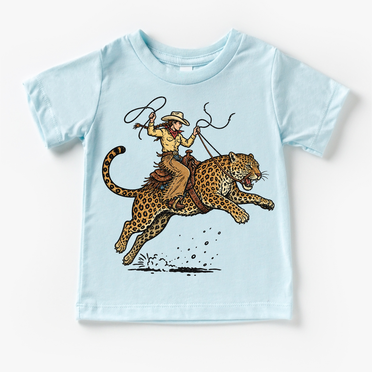 Cowgirl Riding Leopard Shirt, Western Animal Kids Tee, Rodeo Leopard Shirt, Wild West Kids Graphic Tee, Funny Cowboy Shirt