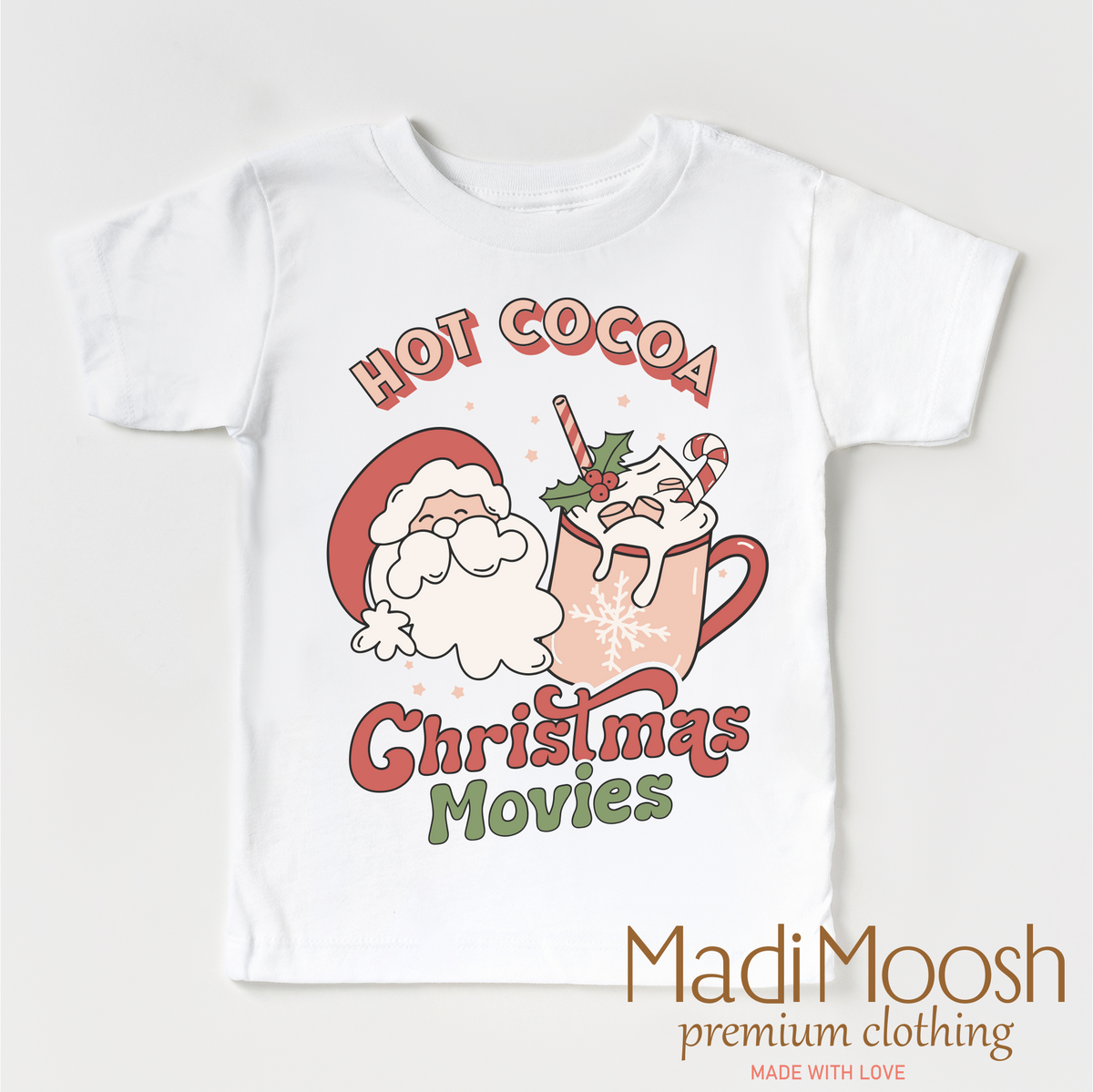 Hot Cocoa And Christmas Movies design on a white garment.