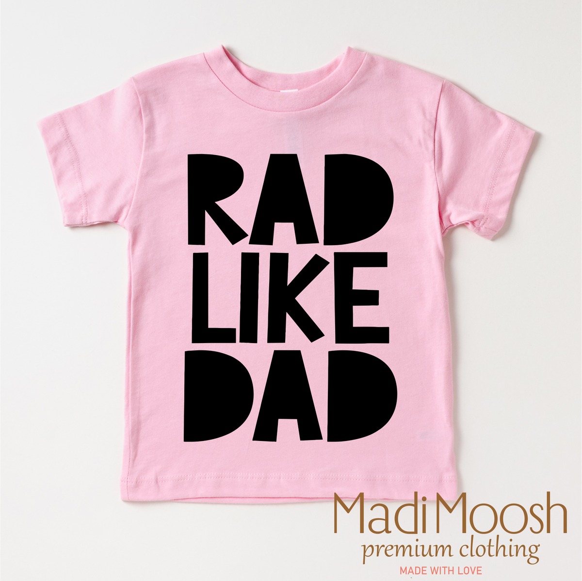 Rad Like Dad design on a pink garment.