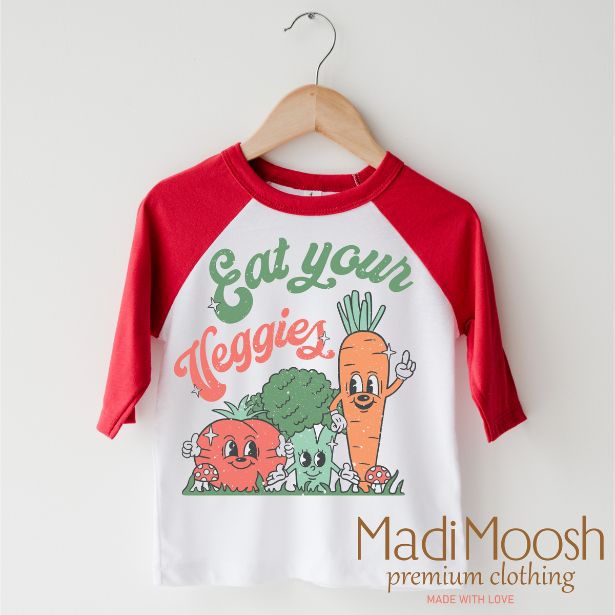 Eat Your Veggies design on a red-accented shirt.