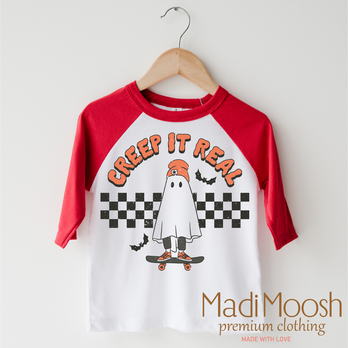 Creep It Real design on a red-accented shirt.