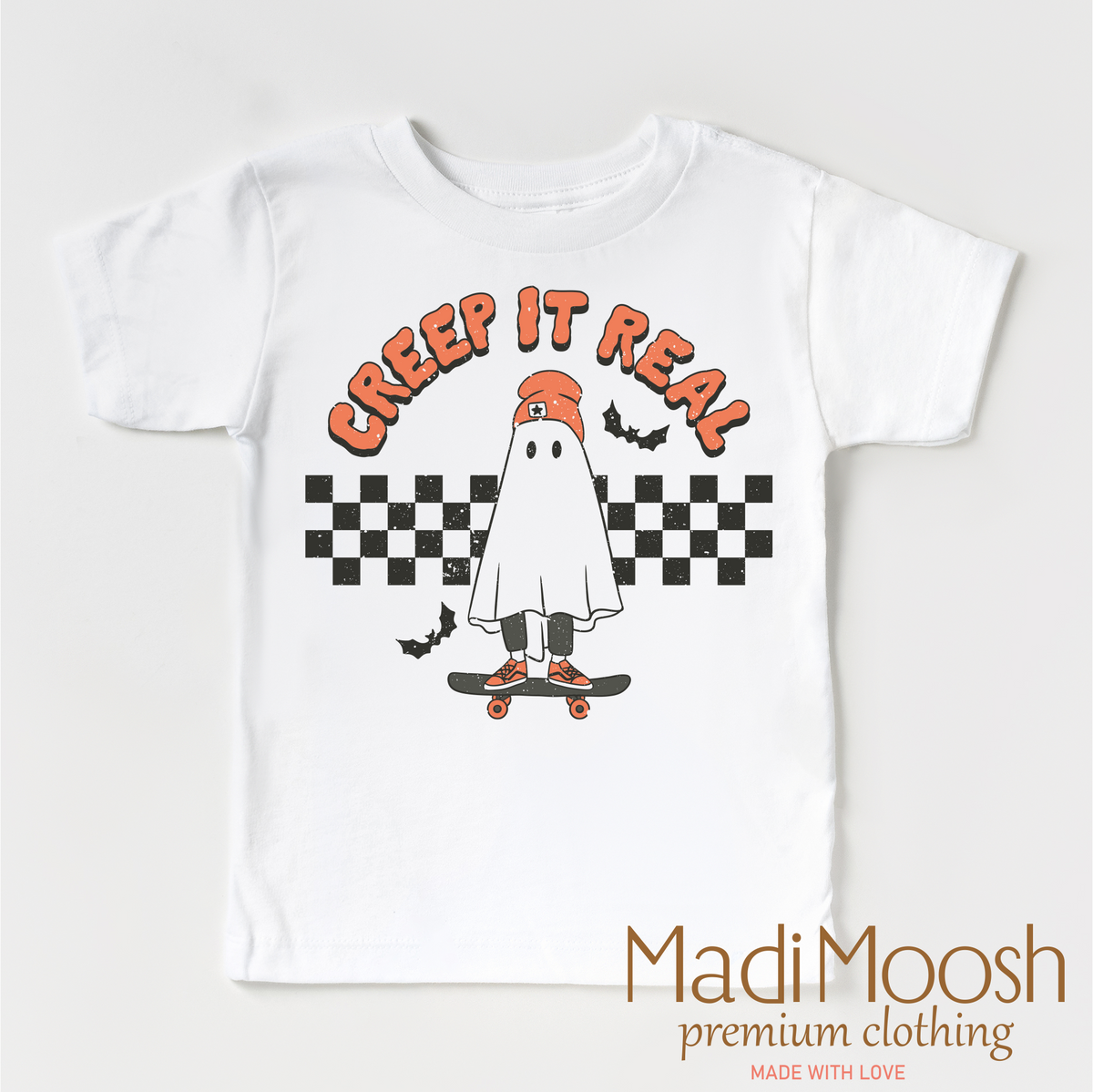 Creep It Real design on a white garment.