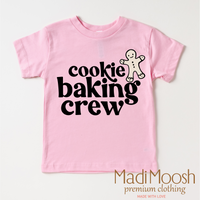 Gingerbread Cookie Baking Crew design on a pink garment.