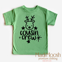 Cousin Crew Christmas design on a green garment.