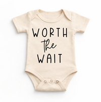 Worth The Wait Bodysuit design on a natural garment.