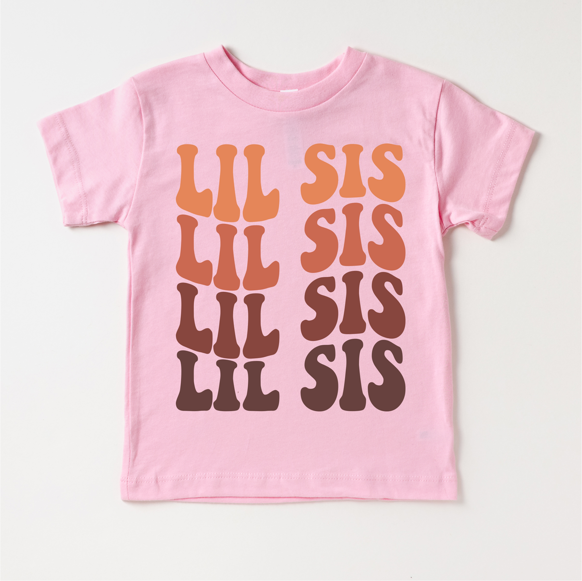 Retro Lil Sis Siblings Family design on a pink garment.
