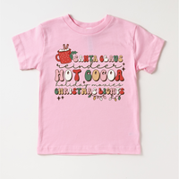 Hot Cocoa Reindeer Christmas design on a pink garment.
