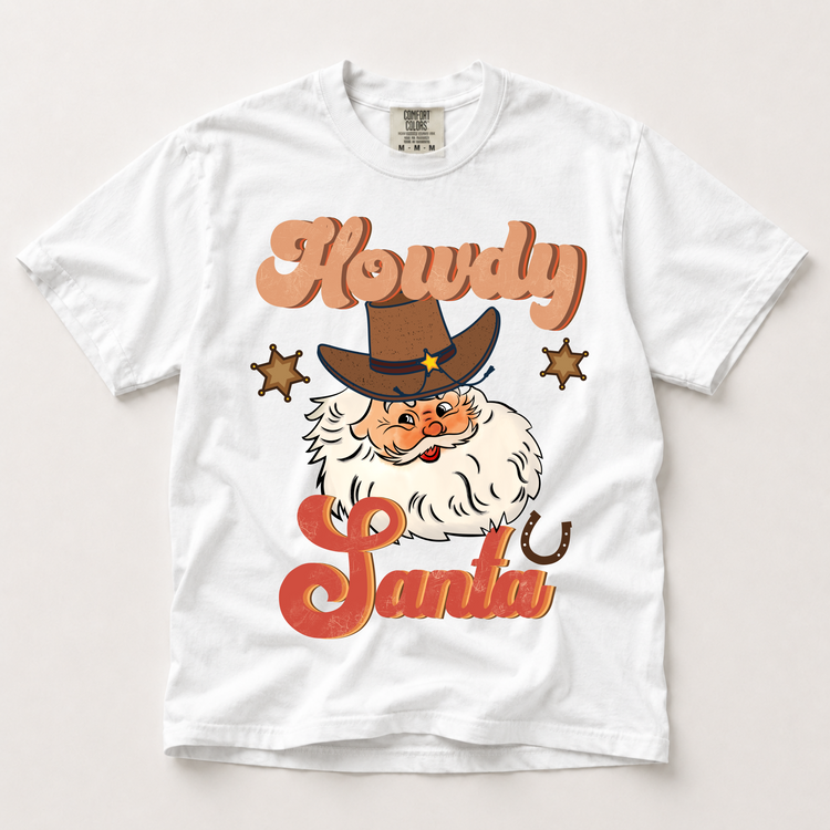 Howdy Santa cowboy Christmas graphic on a white Comfort Colors T-shirt