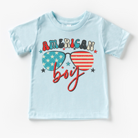 Retro American Boy 4th Of July design on a blue garment.