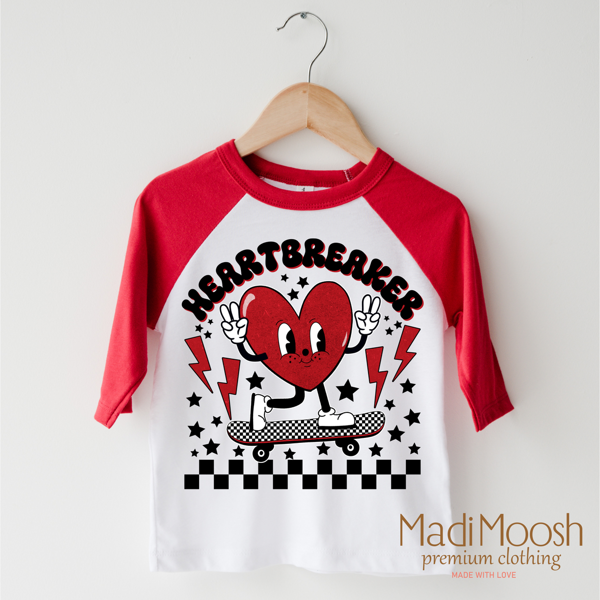 Heartbreaker Valentine design on a red-accented shirt.