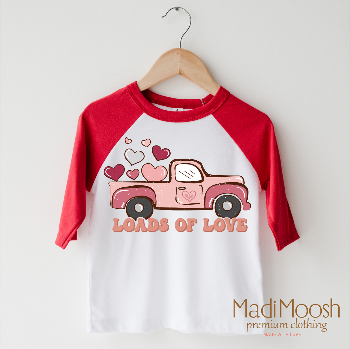 Loads Of Love Valentine design on a red-accented shirt.