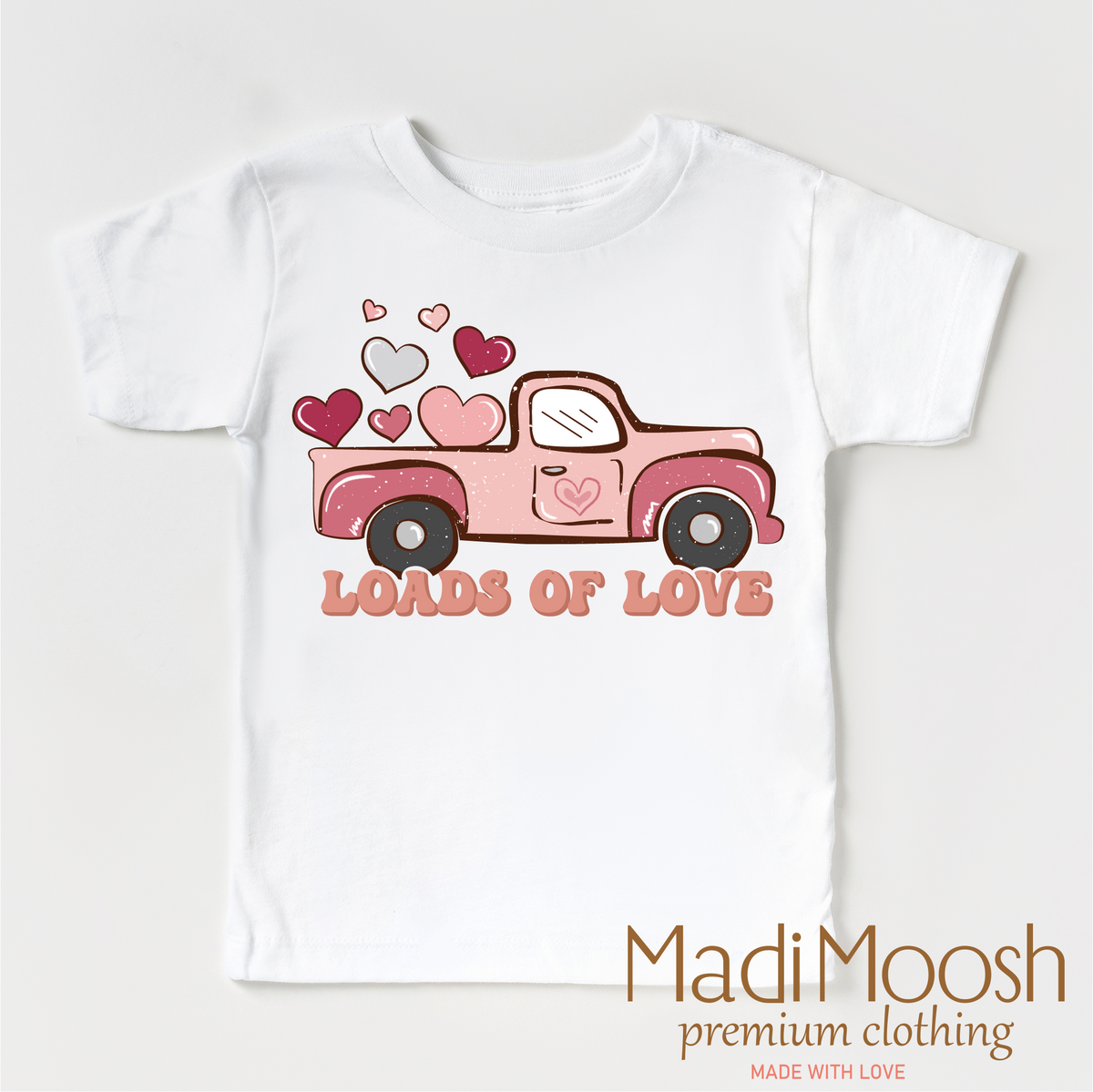 Loads Of Love Valentine design on a white garment.