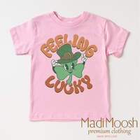 Feeling Lucky Retro St. Patrick's Day design on a pink garment.
