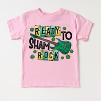 Ready To Shamrock St. Patrick's Day design on a pink garment.
