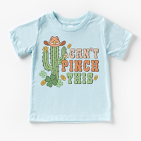 Western St. Patrick's Day design on a blue garment.