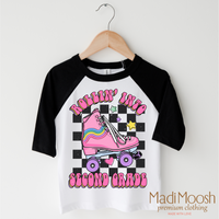 Rollin Into Second Grade Back To School design on a black-accented shirt.