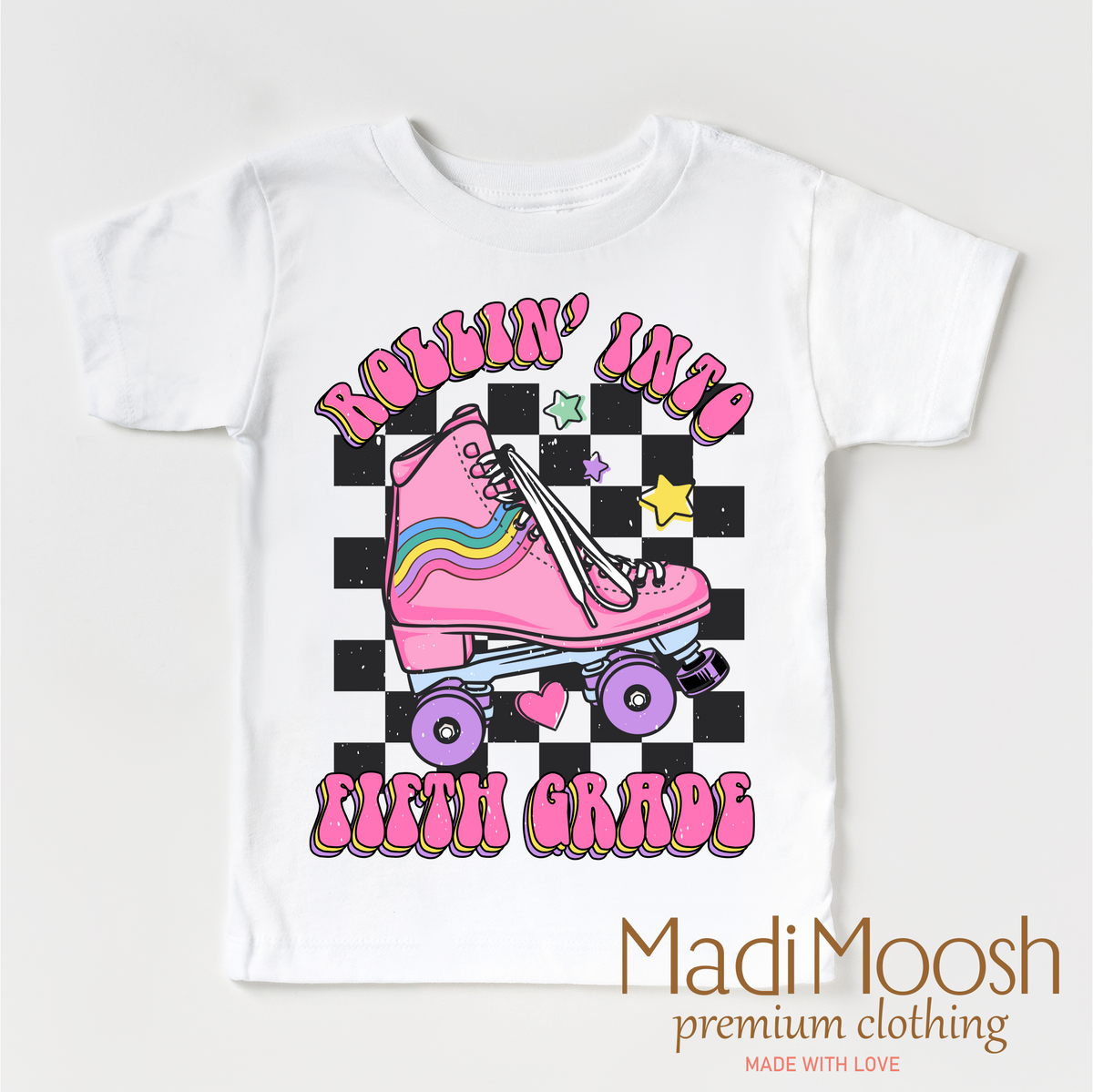 Rollin Into Fifth Grade Back To School design on a white garment.