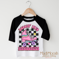 Rollin Into Kindergarten Back To School design on a black-accented shirt.