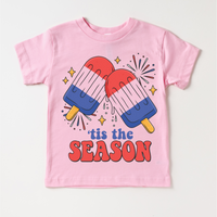 Tis The Season 4th Of July design on a pink garment.