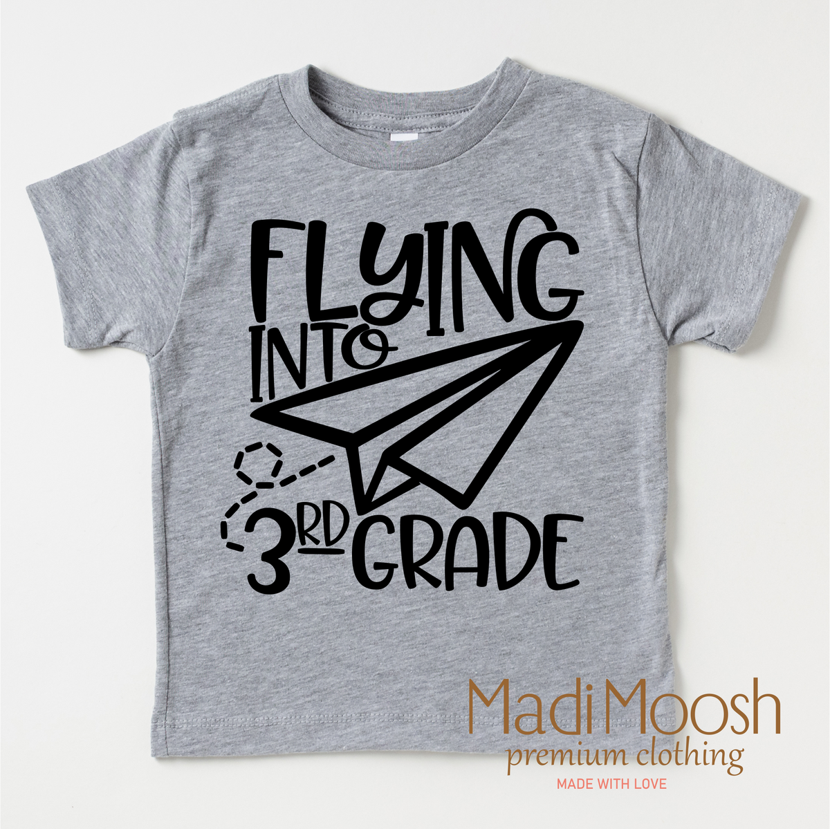 Flying Into 3rd Grade Back To School design on a gray garment.