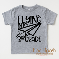 Flying Into 3rd Grade Back To School design on a gray garment.