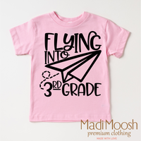 Flying Into 3rd Grade Back To School design on a pink garment.