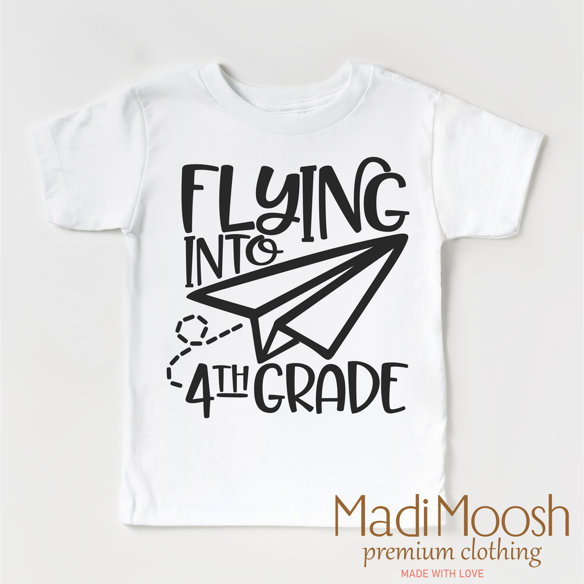 Flying Into 4th Grade Back To School design on a white garment.