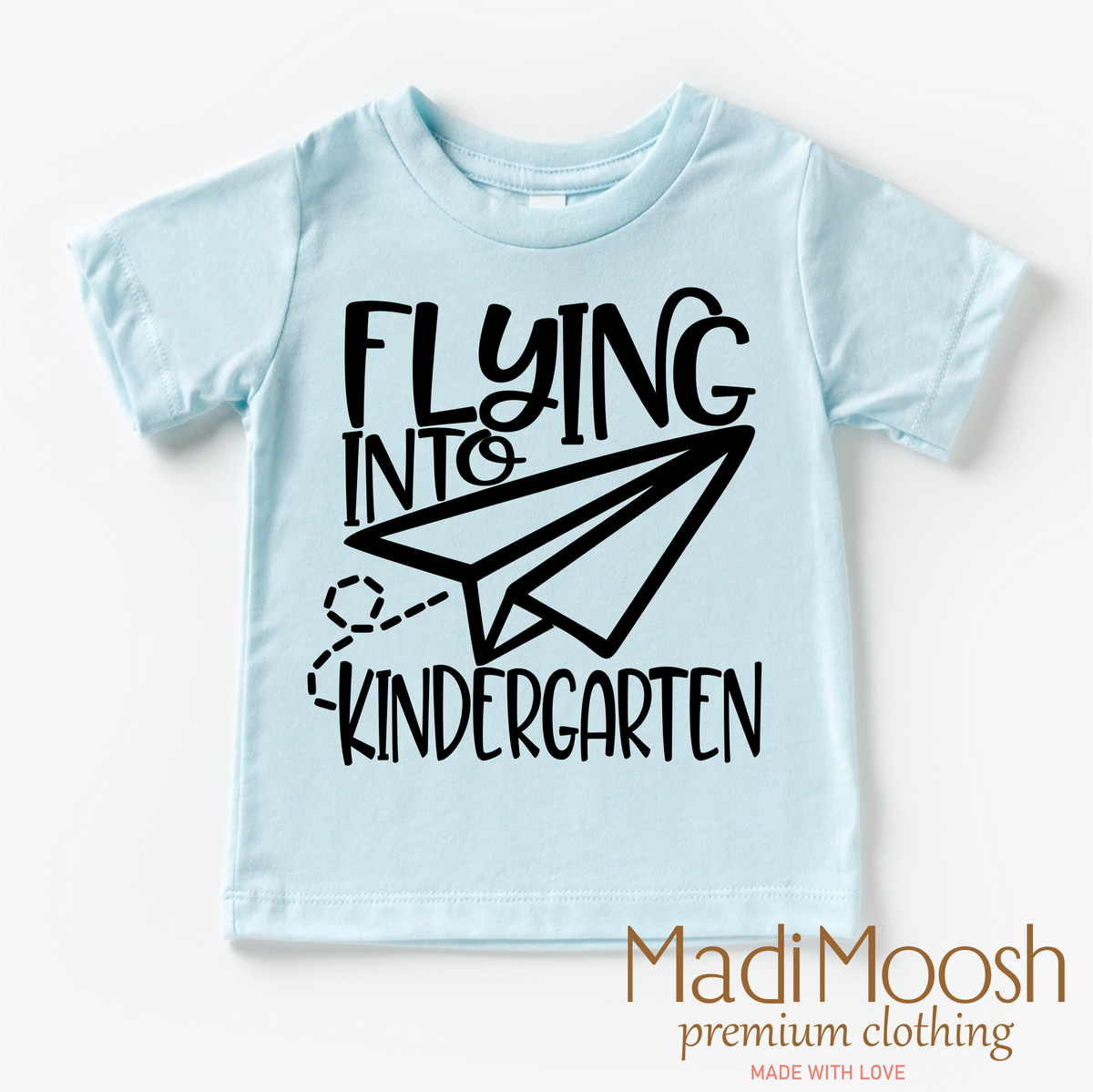 Flying Into Kindergarten Back To School design on a blue garment.