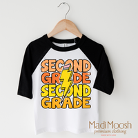 Second Grade Lightning Bolt design on a raglan shirt with black sleeves.