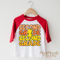 Second Grade Lightning Bolt design on a raglan shirt with red sleeves.