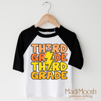 Third Grade Lightning Bolt design on a raglan shirt with black sleeves.
