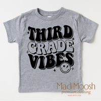 Third Grade Vibes design on a gray kids shirt.