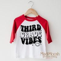 Third Grade Vibes design on a raglan shirt with red sleeves.
