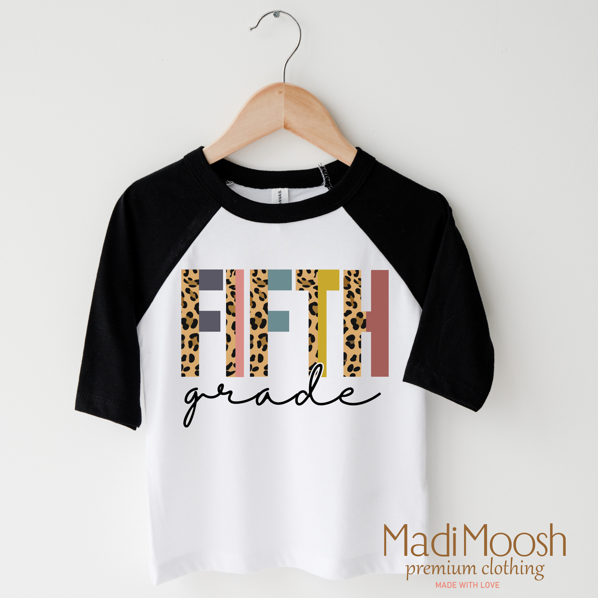 Fifth Grade design on a raglan shirt with black sleeves.