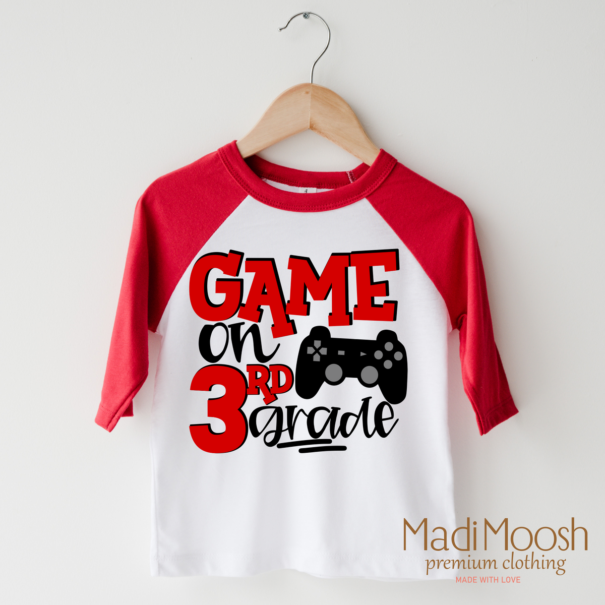 Game On Third Grade Back To School design on a raglan shirt with red sleeves.
