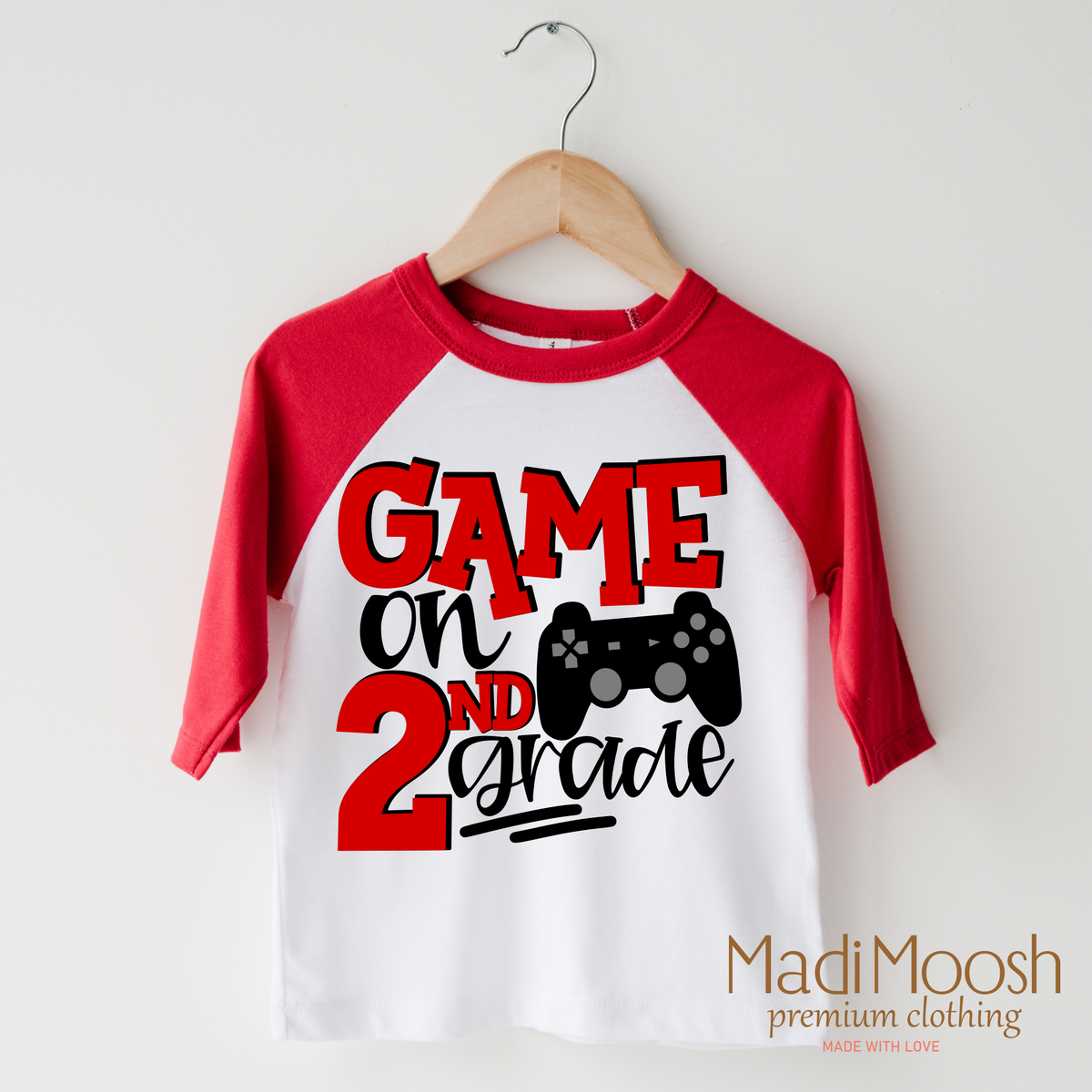 Game On Second Grade Back To School design on a raglan shirt with red sleeves.