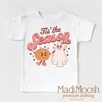 Tis The Season design on a white short sleeve T-shirt.