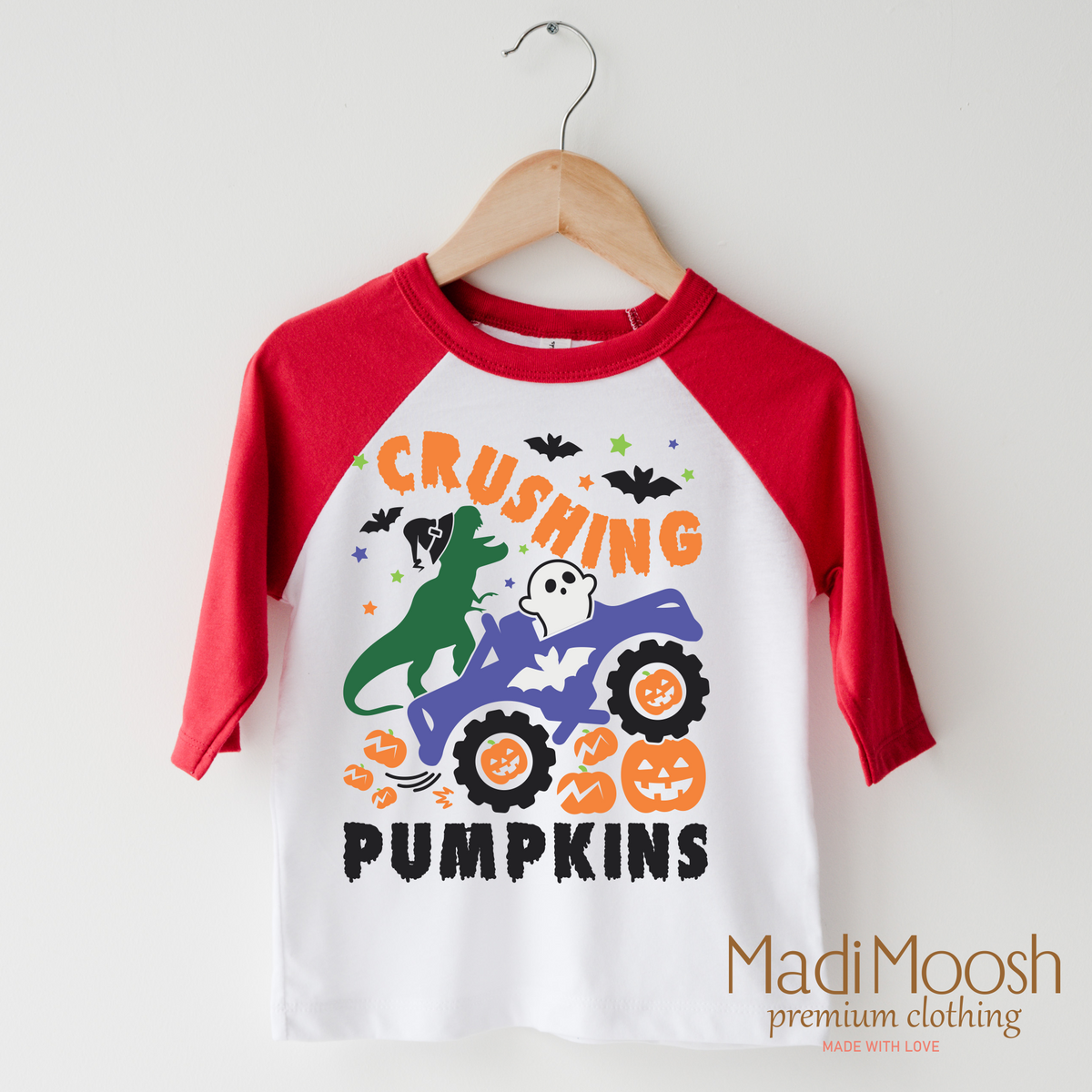 Cushing Pumpkins design on a raglan shirt with red sleeves.