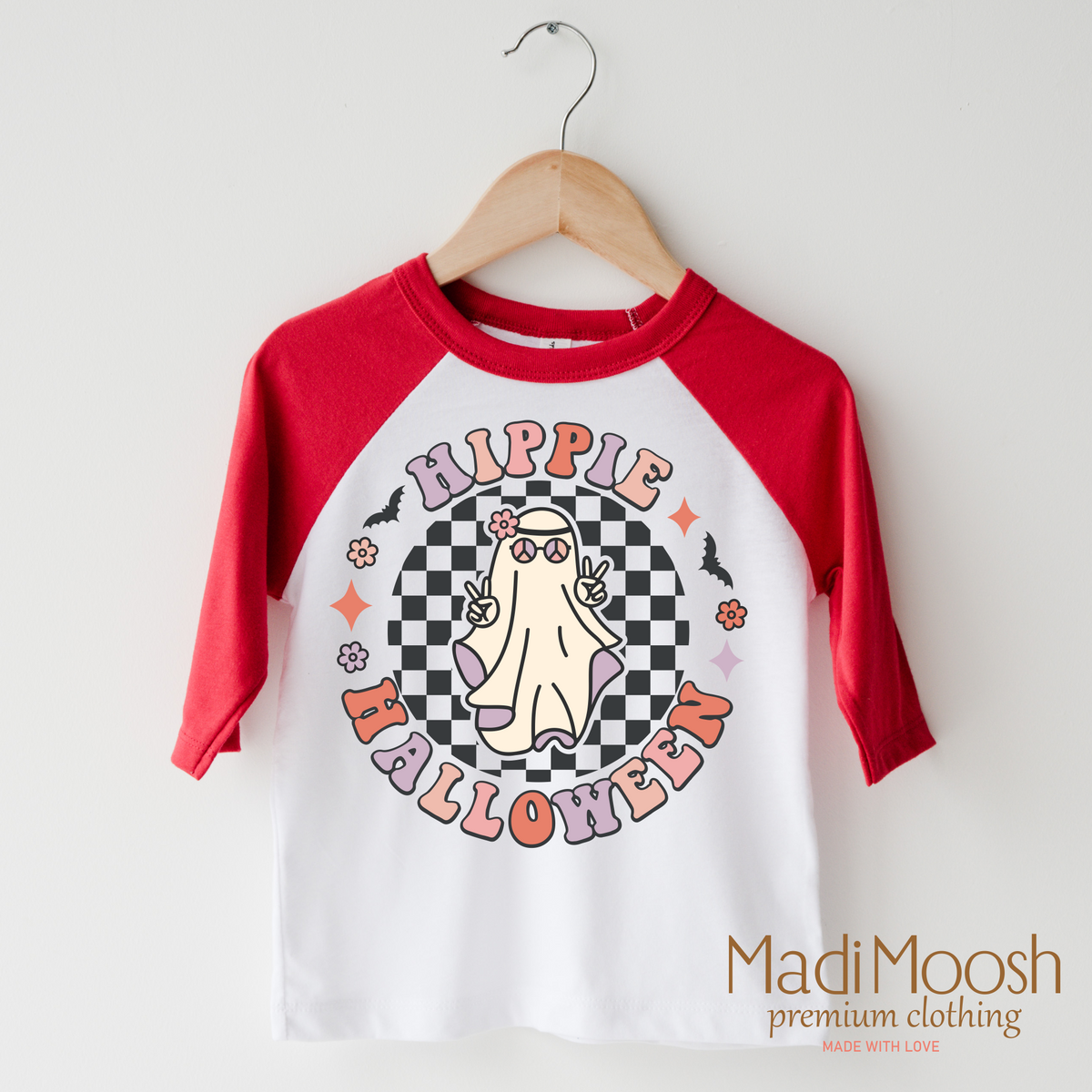 Hippie Halloween Ghost design on a raglan shirt with red sleeves.