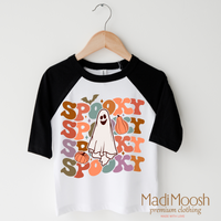 Spooky Ghost design on a raglan shirt with black sleeves.