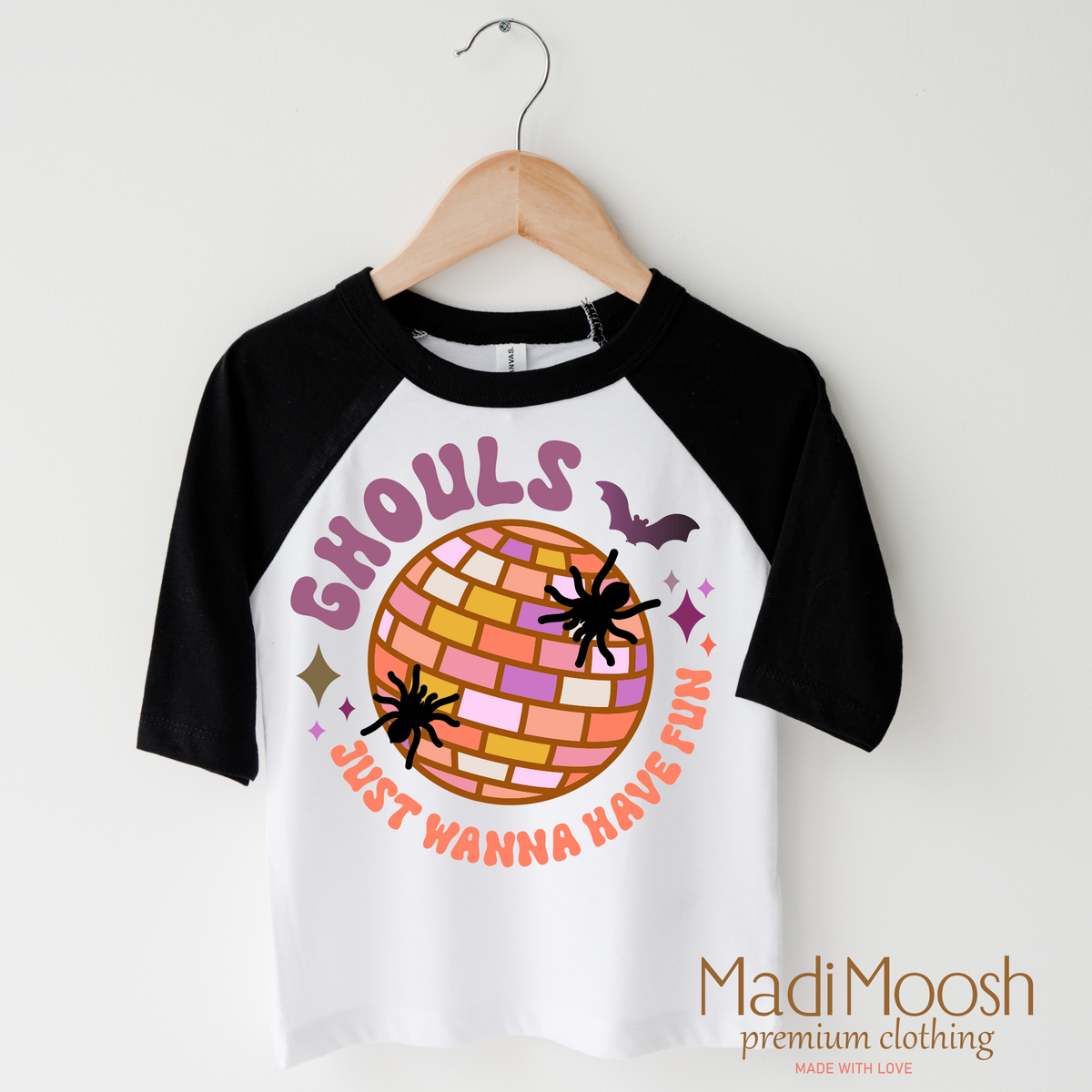 Ghouls Just Want To Have Fun design on a raglan shirt with black sleeves.