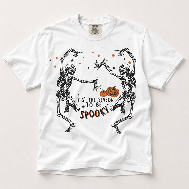 Tis the Season to Be Spooky dancing skeleton graphic on a white Comfort Colors T-shirt